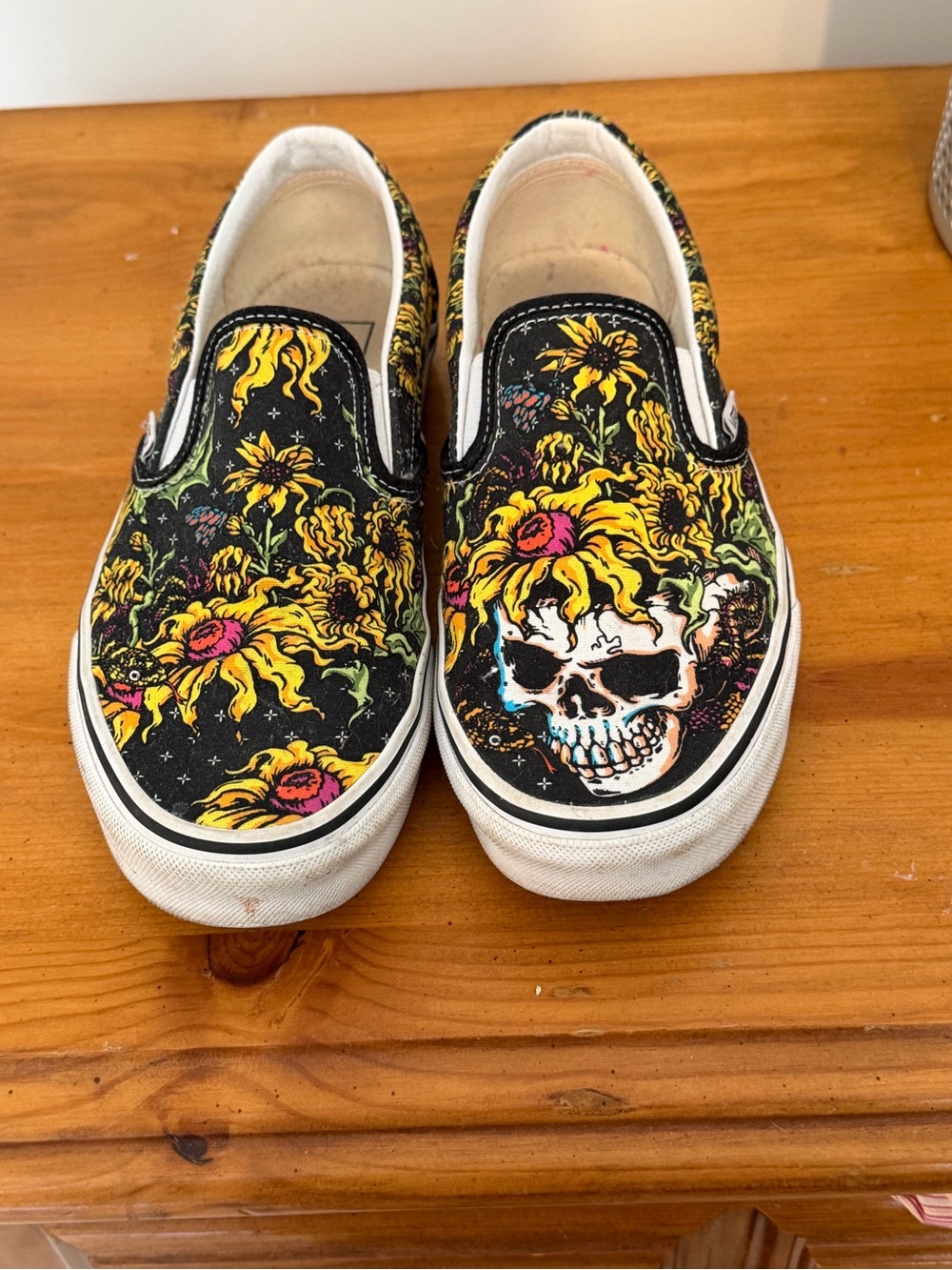 Vans Black Canvas Slip-On Sneakers with Yellow & Pink Skull Sunflower Graphic
